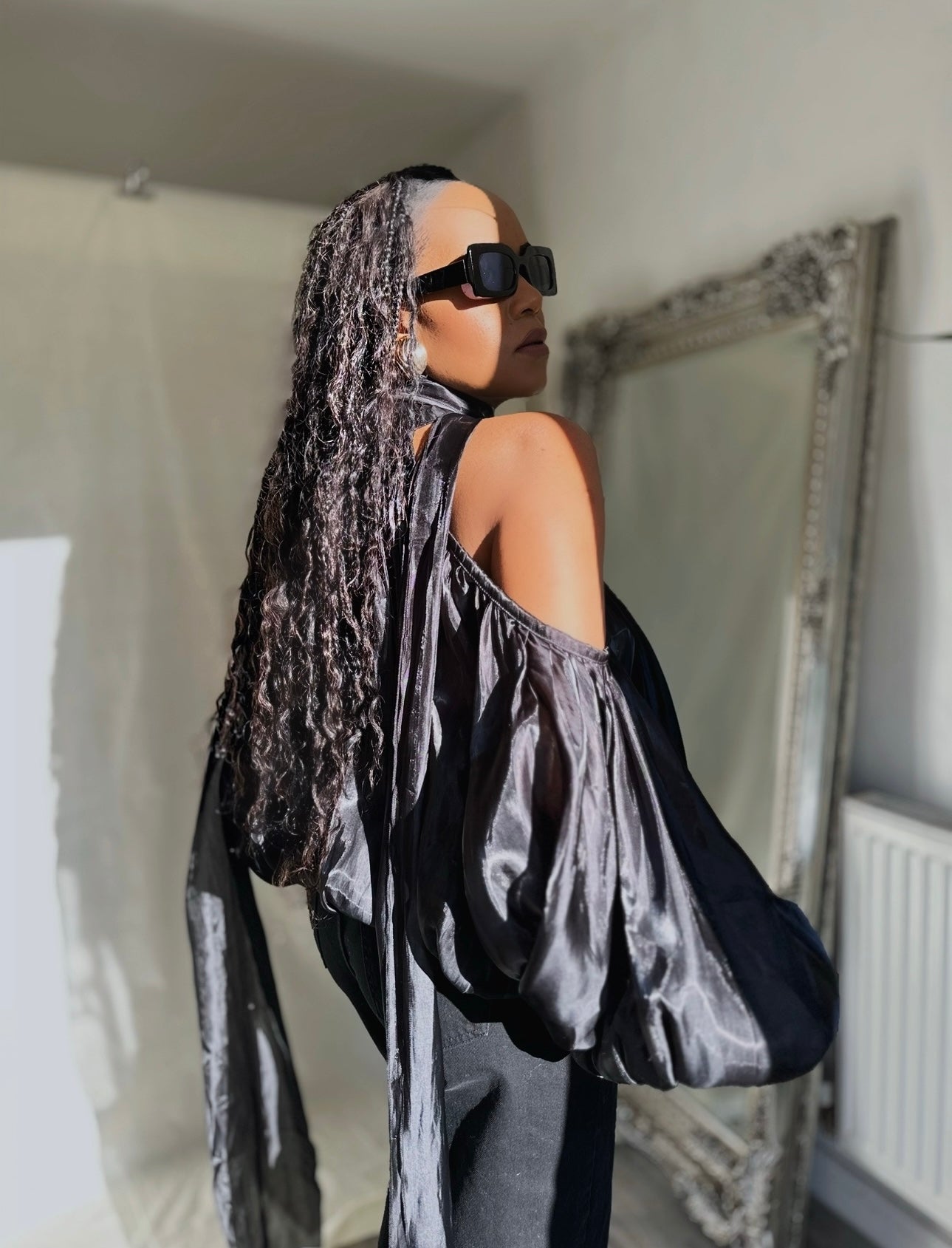 An Open Shoulders Blouse With Neck Scarf