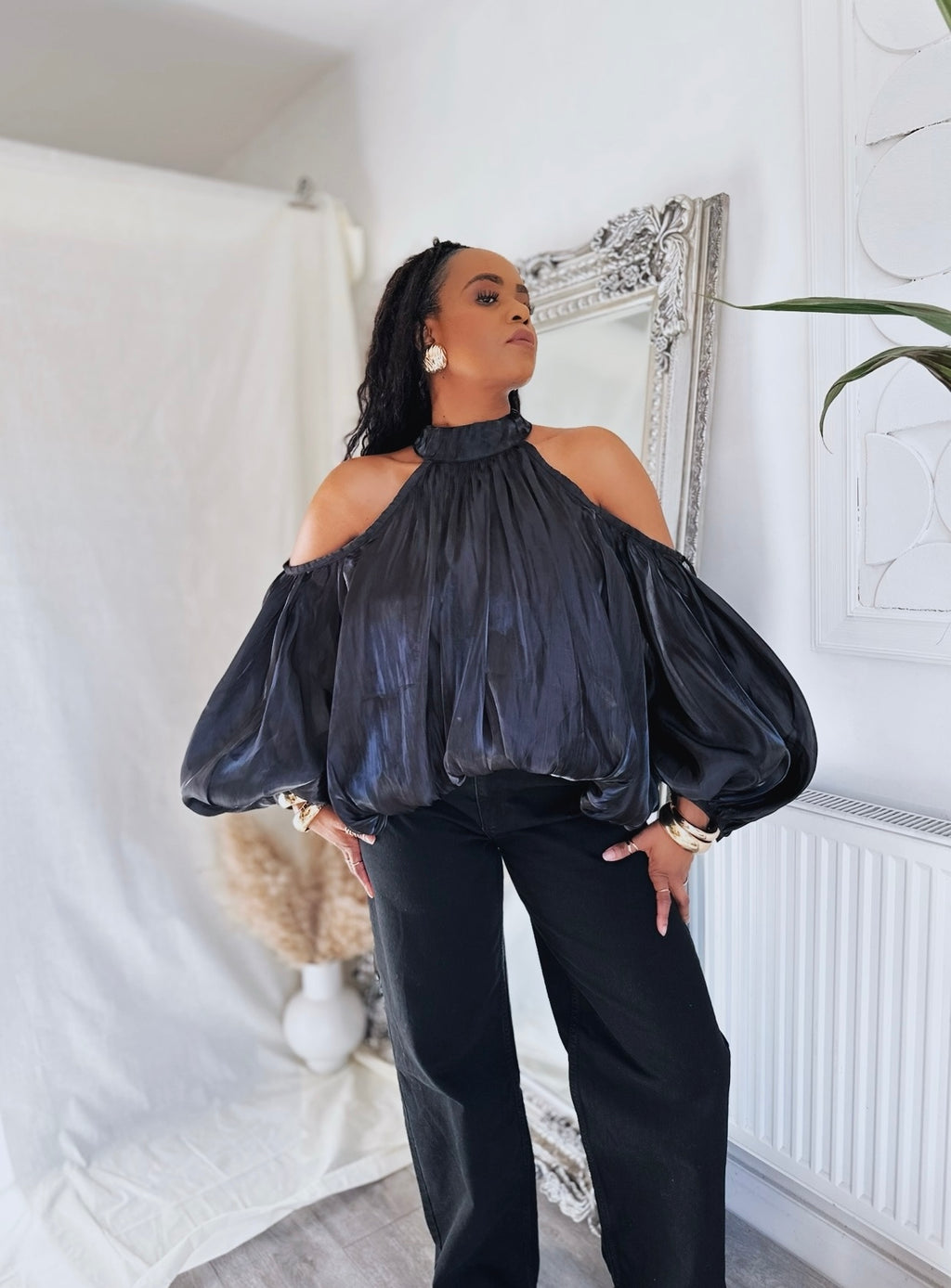 An Open Shoulders Blouse With Neck Scarf